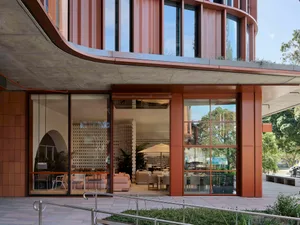 Modern retail storefront featuring concrete and glass materials