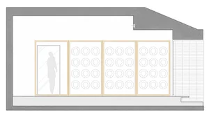 A technical design floor plan depicting a modern storefront with large glass windows.