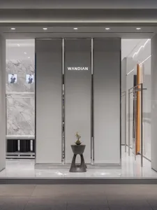 A minimalist storefront with glass panels and modern design features.