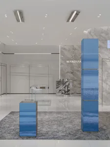 Modern retail storefront with blue tiled columns and white marble wall