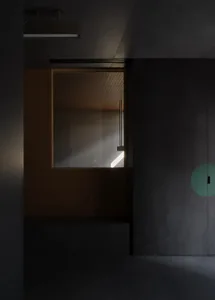 Interior of a modern minimalist flat with concrete walls and floor.