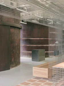 Modern office space featuring metal, wood, and concrete materials