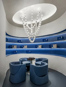 Modern retail storefront with blue display units and lighting feature