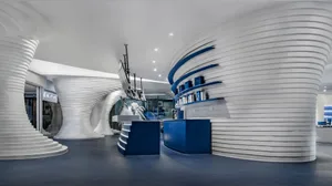 Modern storefront design with metal, glass, and concrete materials