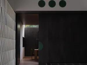 A sleek, modern office space featuring metallic finishes.
