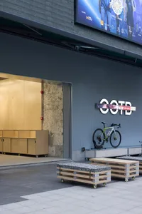 Industrial storefront with metal and concrete elements
