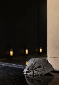 A minimalist design with natural stone elements.