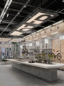 Industrial-style retail shop featuring concrete finishes and minimalist design.
