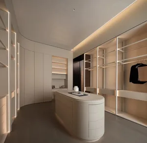 A minimalist wardrobe with neutral-toned wood elements and an oval-shaped island.