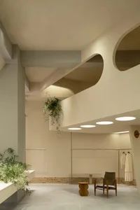 Modern retail storefront featuring concrete structural elements