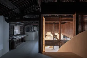 Modern art gallery featuring wooden interior design elements.