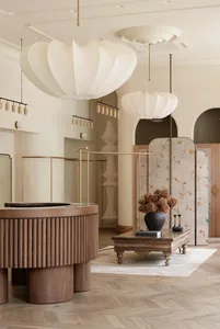 Modern retail shop featuring high-quality wood, fabric, and metal fixtures