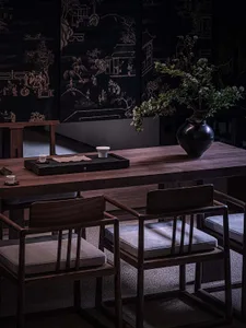 A cozy coffee shop interior with wooden furniture and decorative plants.