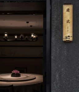Marble restaurant interior with elegant lighting and signage