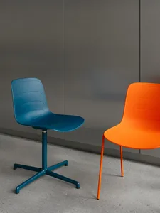 Two modern, colorful office chairs made from plastic material.