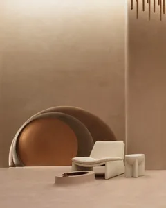 A minimalist, modern interior space featuring textured taupe textiles and abstract art, with a round geometric element in the