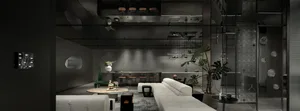 A modern living room with a white sofa and black coffee table.