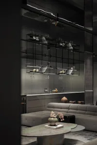 Modern minimalist kitchen featuring black metal accents and lighting