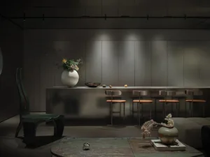 A modern minimalist living room featuring concrete, metal, and wood materials.