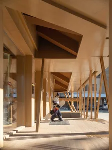 Industrial-style public space with wooden architecture and interior design elements.