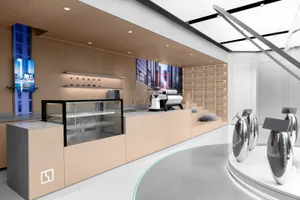 Modern coffee shop with neutral-toned interior design