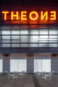 A modern architectural design featuring glass elements.