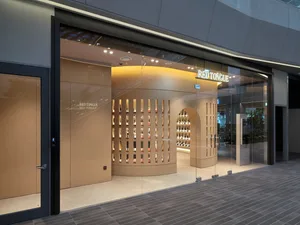 Modern storefront with glass entrance and display window.