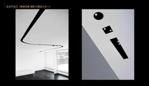 Modern, minimalist interior design featuring sleek, black minimalist lighting fixtures.
