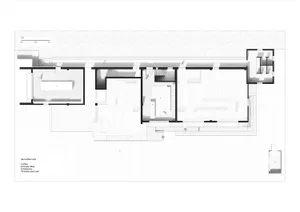 A 2D architectural drawing of an office building with concrete walls and open spaces.