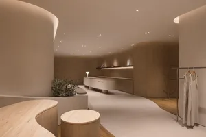 A modern retail storefront with wooden interiors and curved architecture.