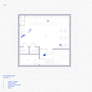 Minimalist architectural floor plan of a retail space, showing layout, furnishings, and functional zones.