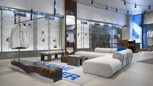 Modern retail interior displaying sportswear and accessories in a sleek, minimalist design.