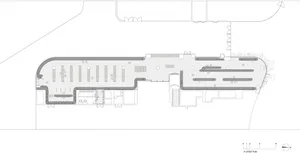 Linear office layout with designated spaces for workstations and common areas.