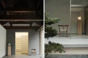 A minimalist interior design featuring simple wooden furniture and a clean, grey palette.