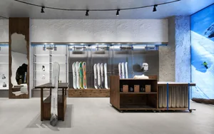 Modern retail store with wood, metal, and glass materials.