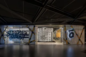 A modern retail shoe store featuring metal and glass elements.