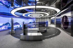 A modern technology center with metallic displays and a futuristic design.