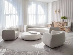 Modern living room with curved furniture and textured upholstery