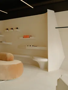 Minimalist storefront featuring a concrete structure with sleek, modern design