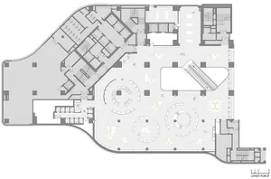 A modern office layout floor plan showing open spaces and rooms.