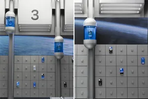 Minimalist retail space with grey lockers and blue water dispensers.