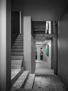 Modern interior featuring marble stairs with minimalist design elements.
