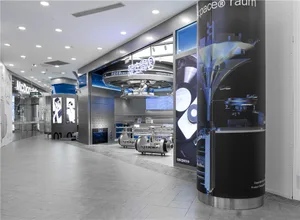 Modern retail storefront featuring industrial metal columns and signage