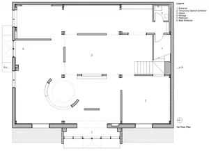 A 2D architectural drawing depicting a top-level floor plan of a modern industrial building with a central atrium, storage ar
