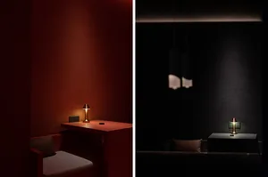 A minimalist space featuring metallic table lamps with a matte finish.
