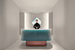Modern reception desk with metal composite material and geometric design.