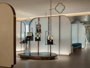 Modern retail storefront displaying metal and glass elements.