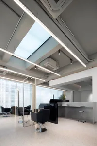 Concrete, glass, and metal interior office rendering.