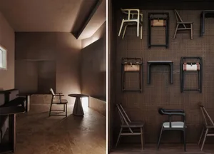 A collection of modern wooden chairs displayed in a dark, minimalist room with a single window.