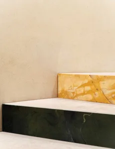Clean, minimalist interior featuring natural marble elements.